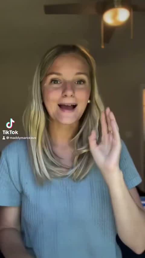 Maddy talking to camera in her living room